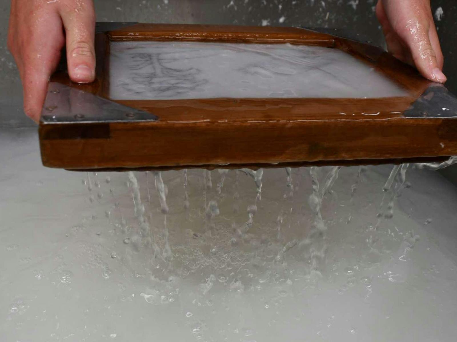 Watermark paper being made.