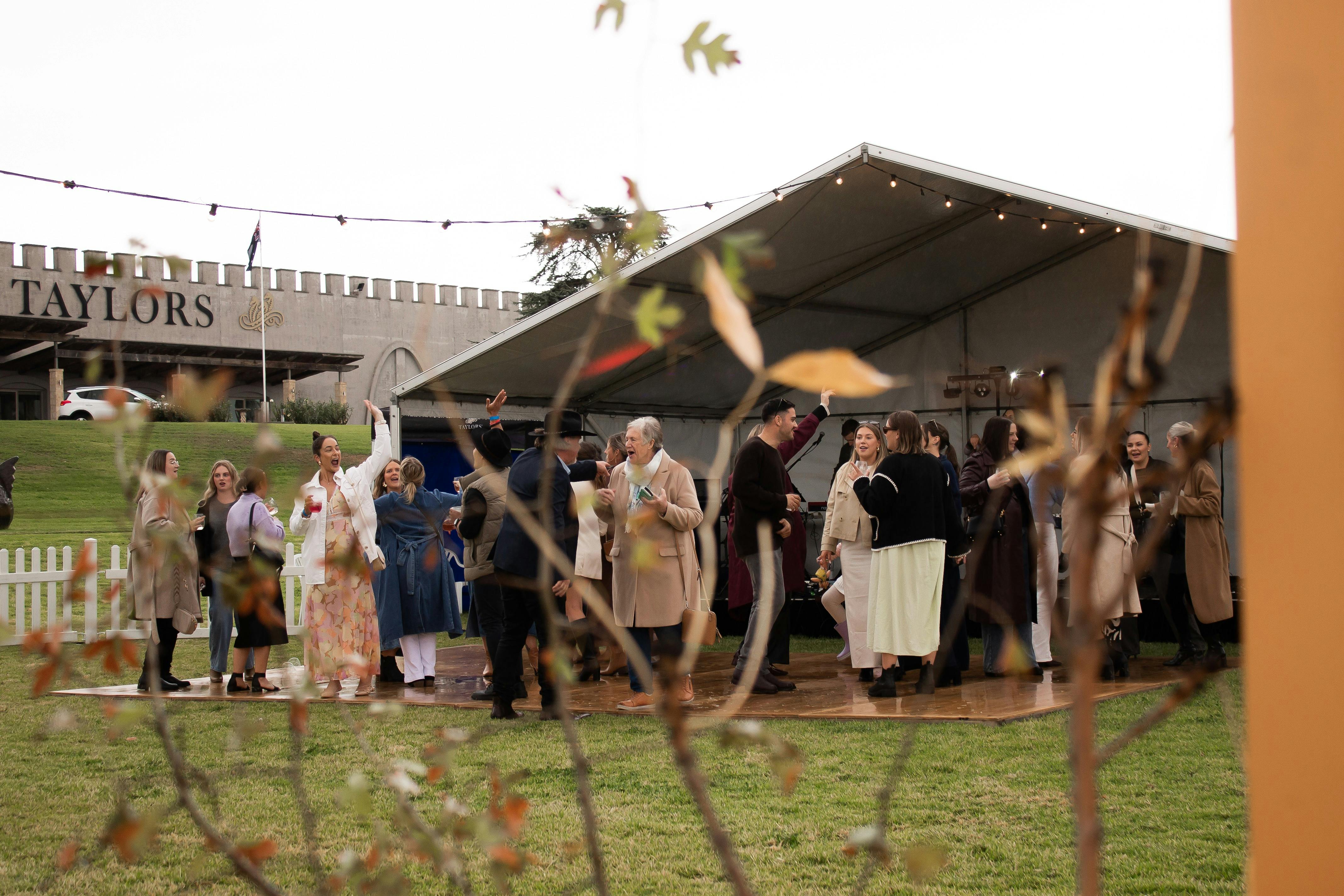 Group of gourmet partygoers on the dance floor