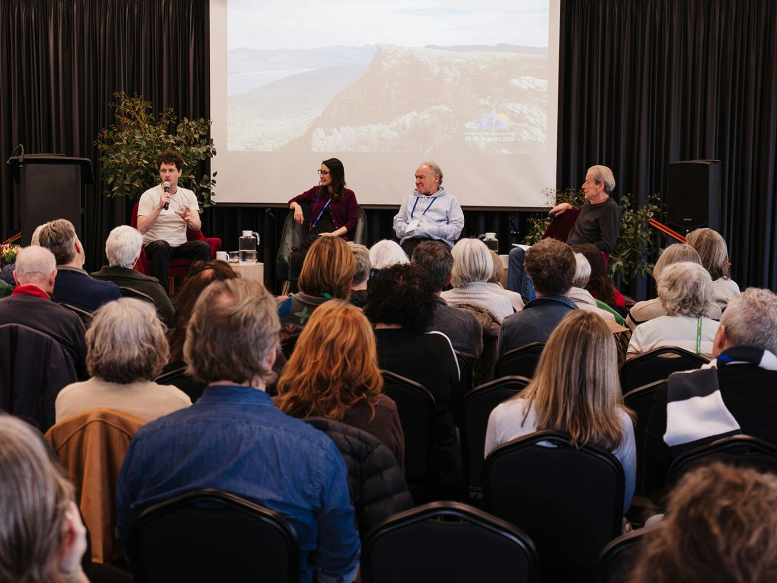 Four people on a literary festival panel