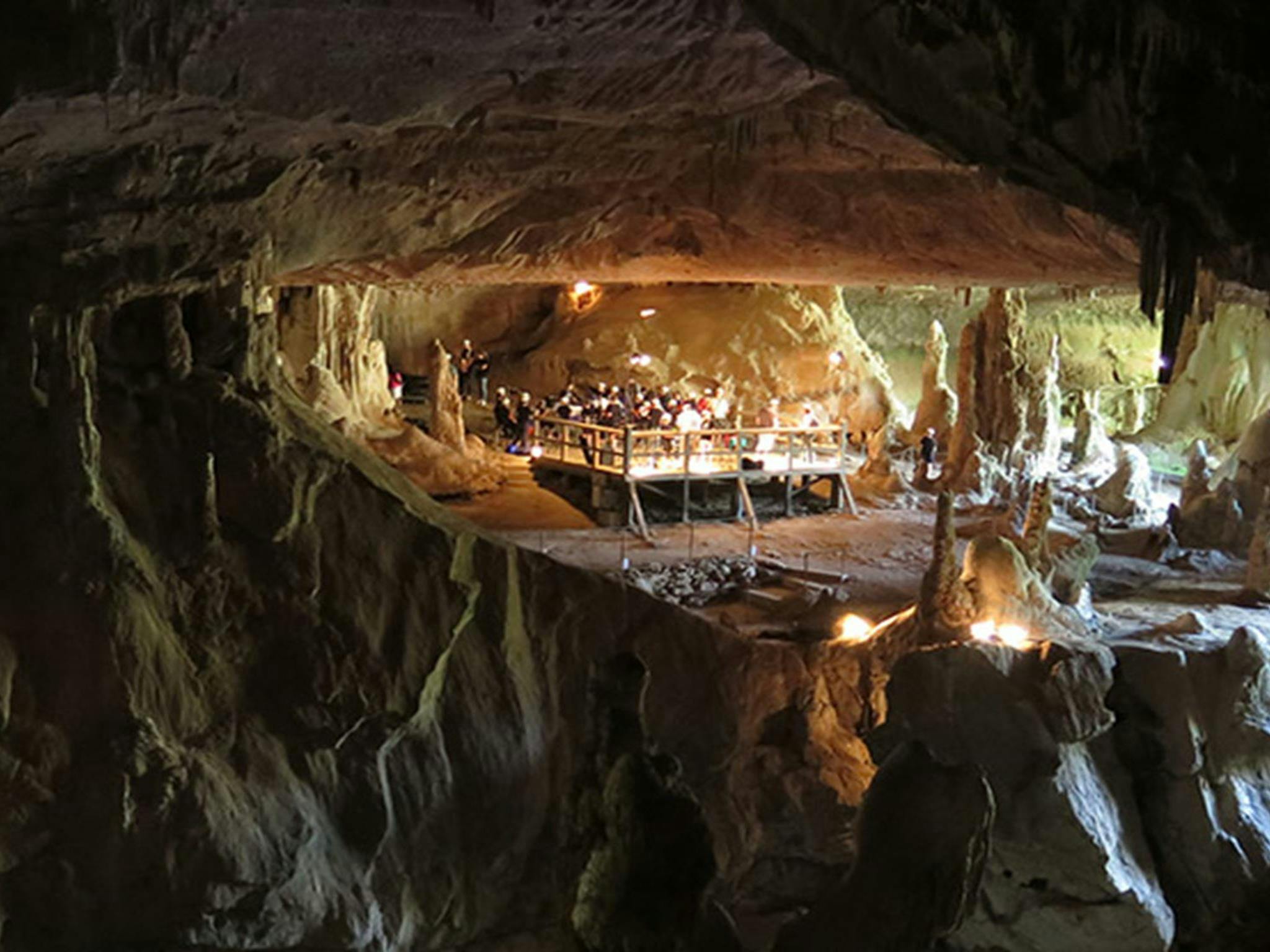 View across Archway Cave to raised platform where a performance group set up, Abercrombie Karst