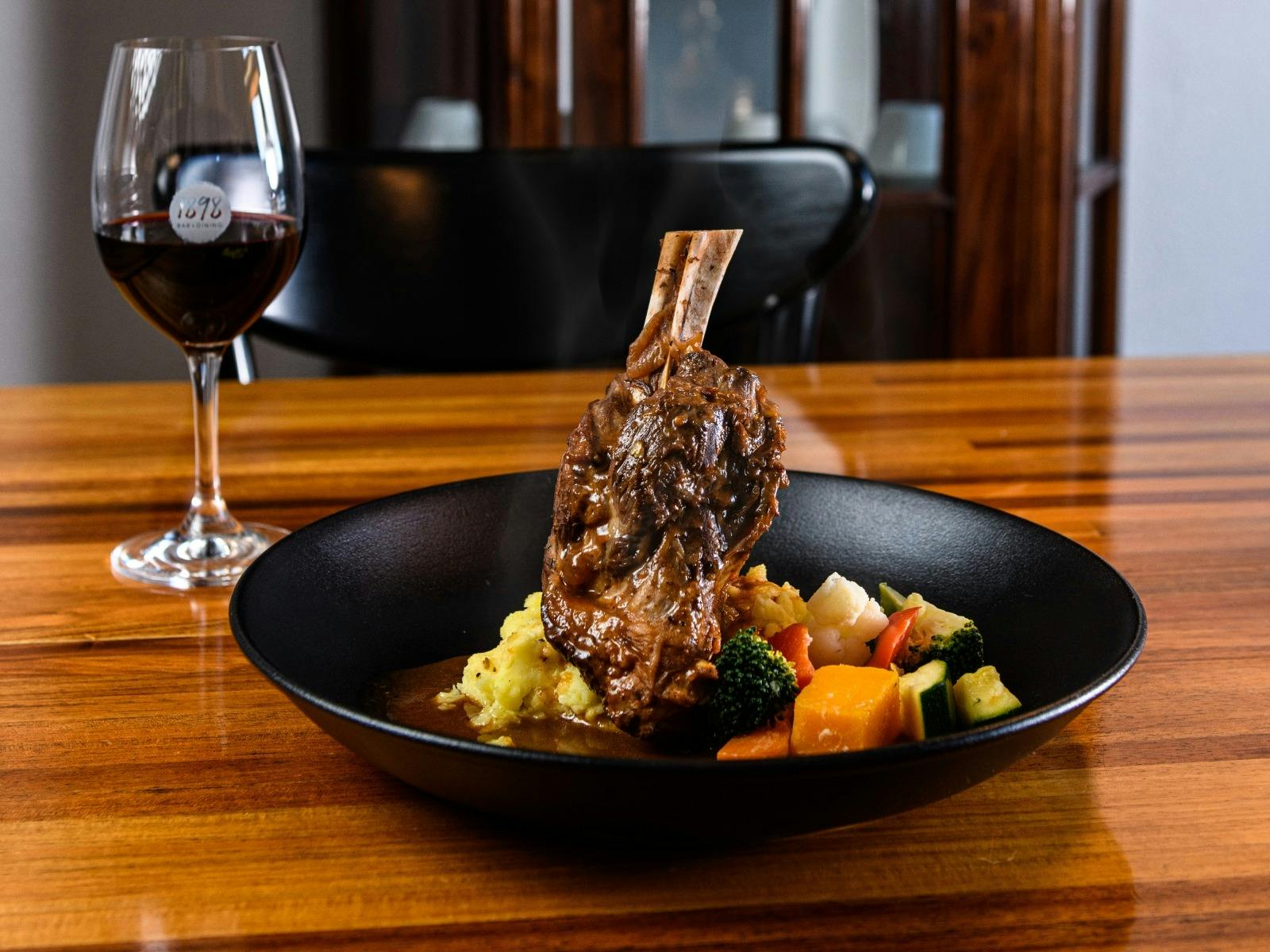 Lamb shank with house drink special image