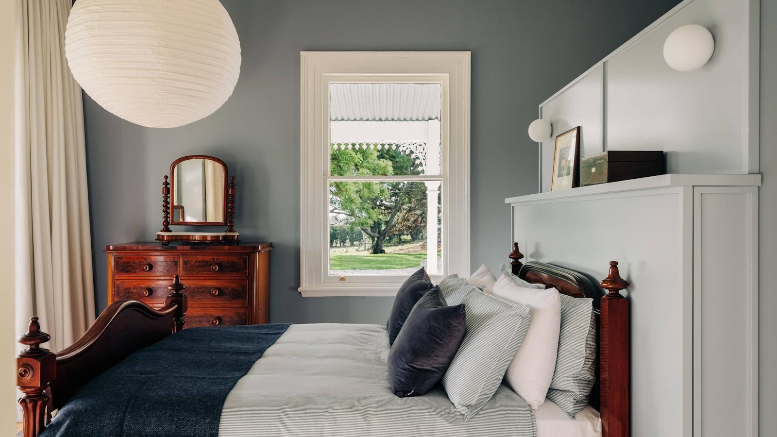 One of three queen suites with luxury bedding and ensuite bathroom with farm and garden views.