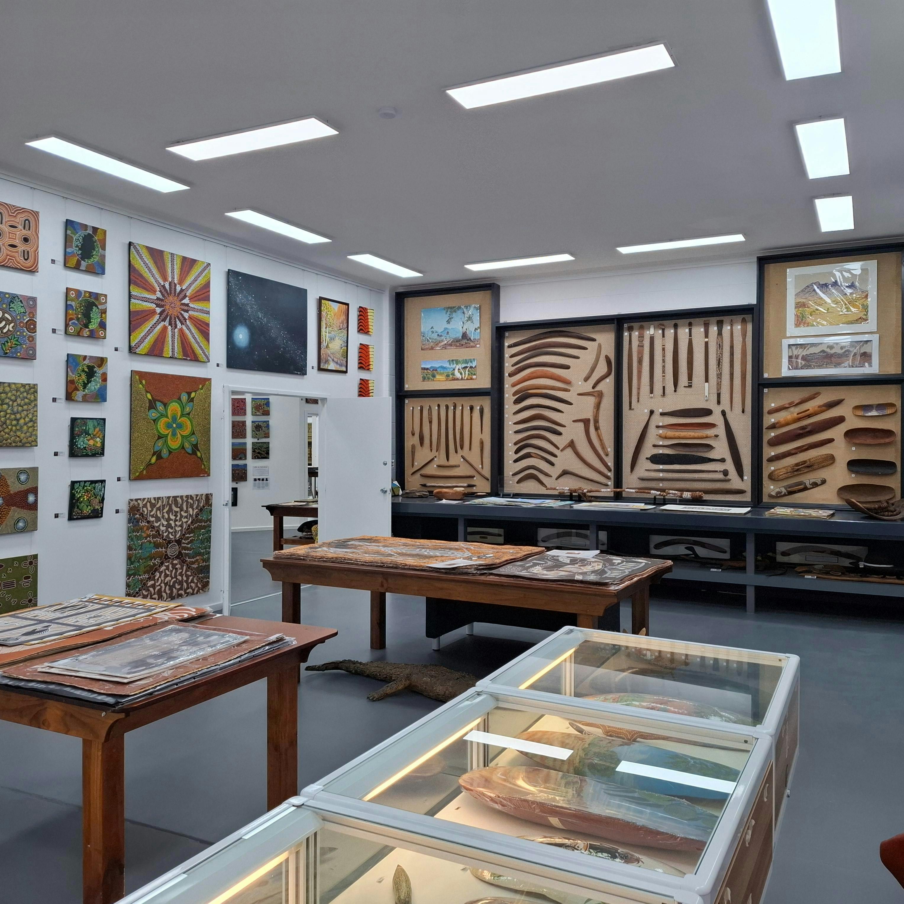 Top end art, artifacts boomerangs, coolamons, clubs woomeras sheilds spears Hermansberg watercolours