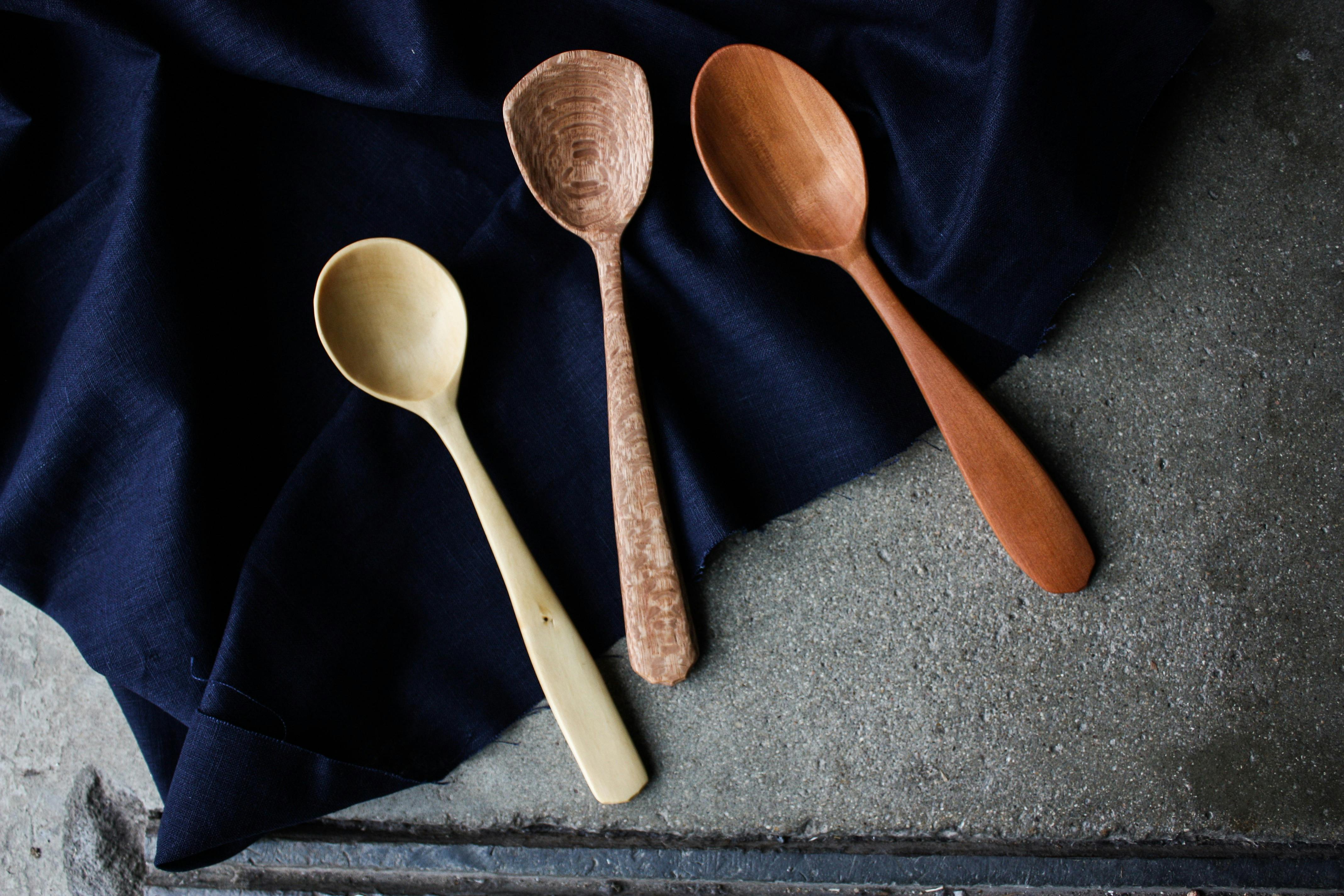 hand carved wooden spoon, and blown bowl
