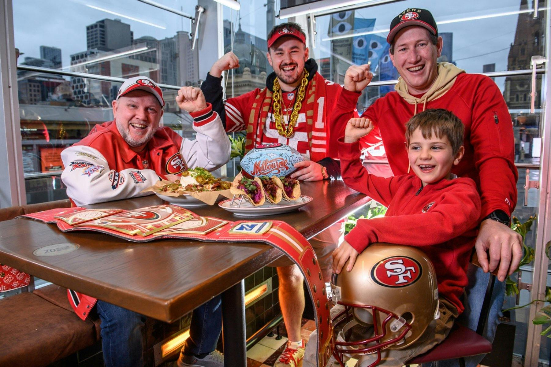Football fans dressed in red jerseys