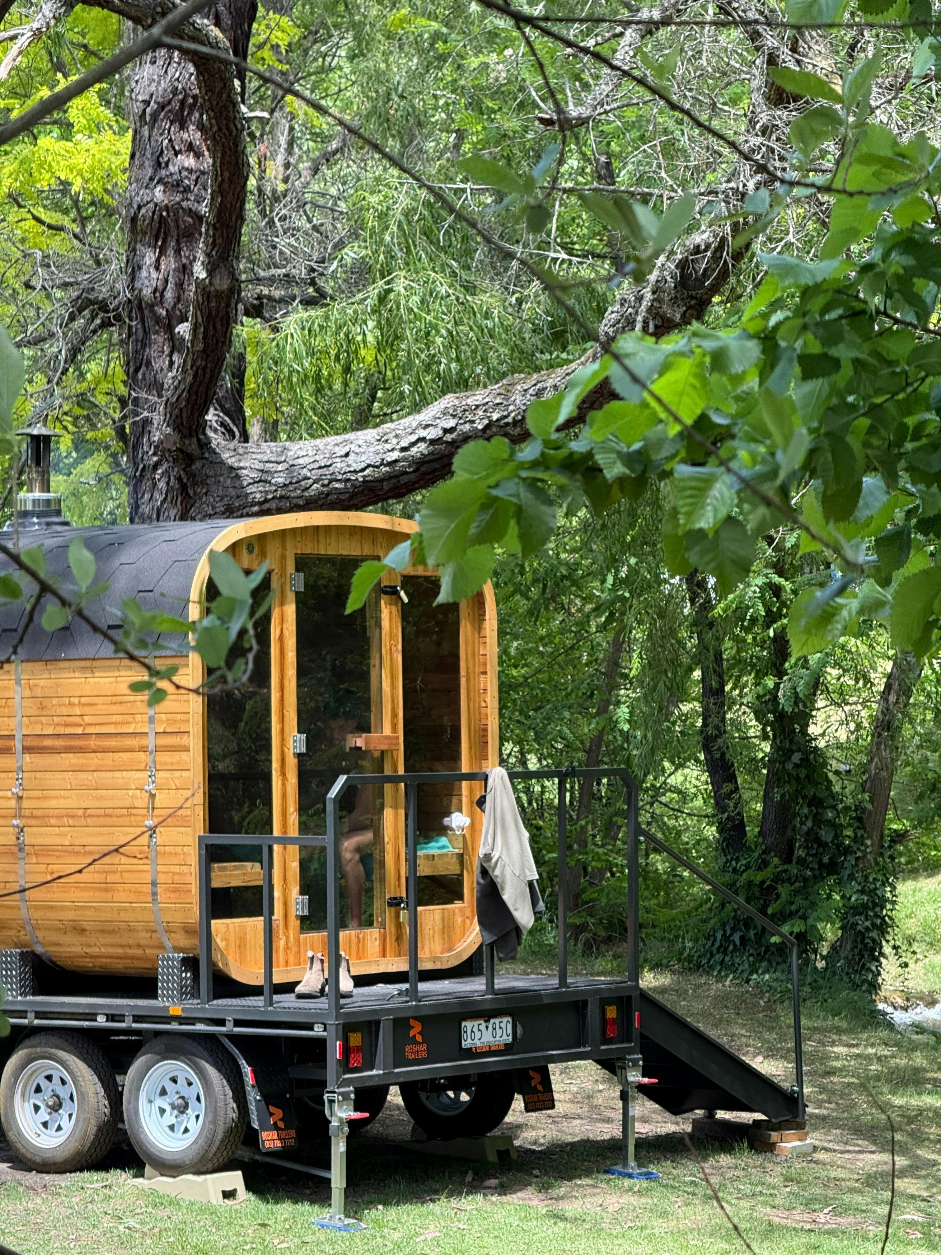 Timber mobile sauna in Bright overlooking Morses Creek, nestled in bushland for a relaxing retreat
