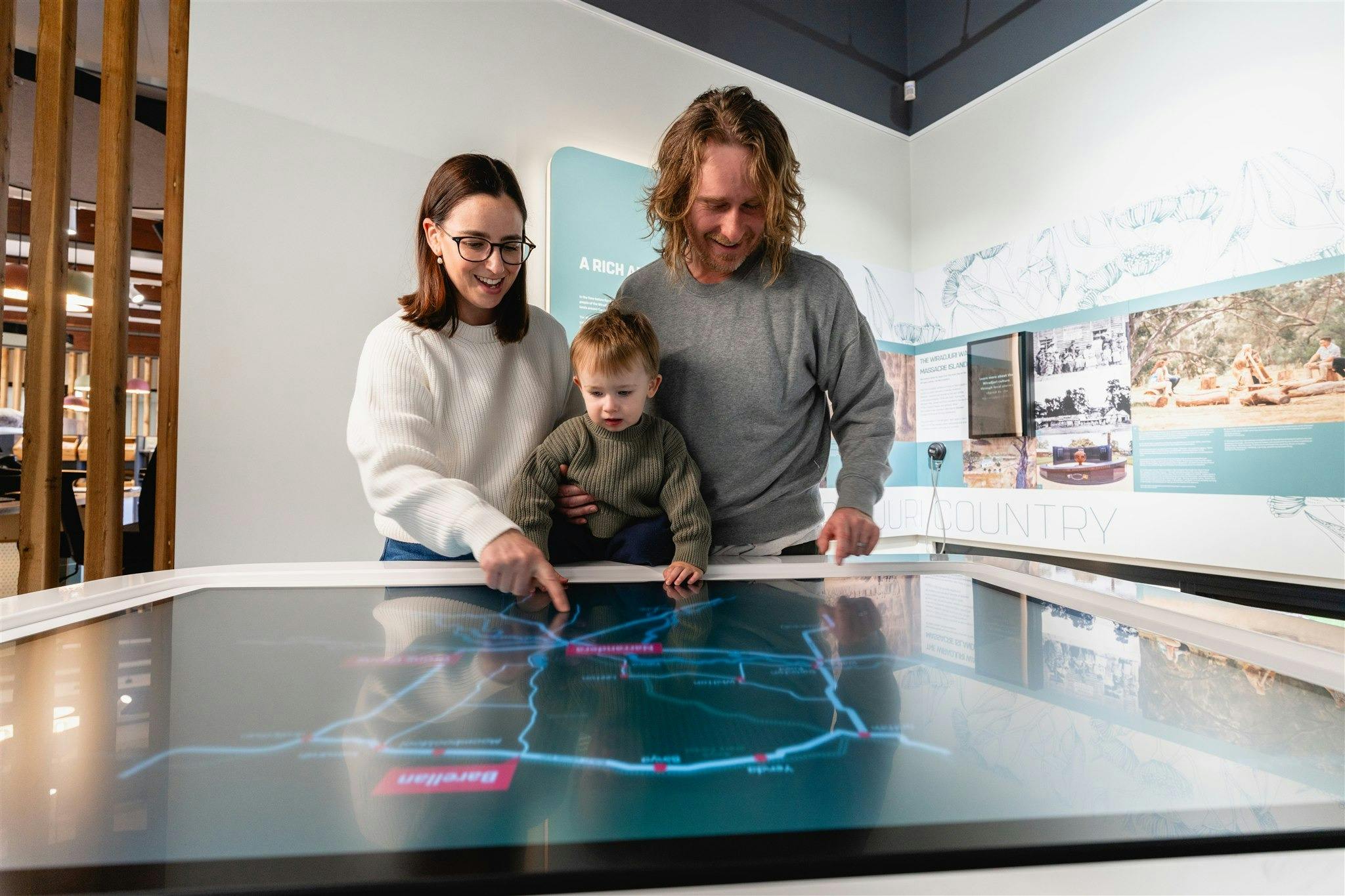 Family using interactive map display