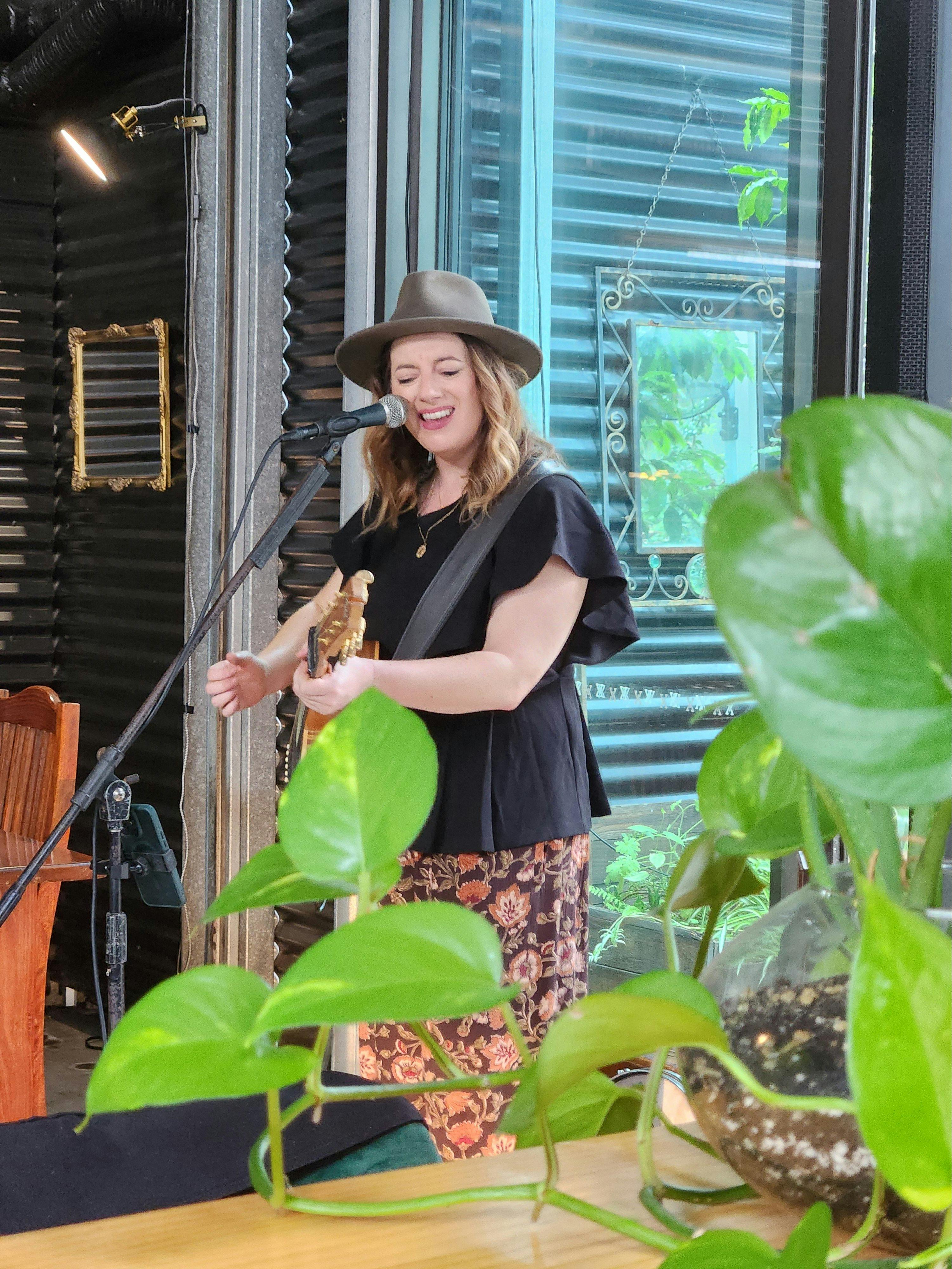 artist singing in dining room