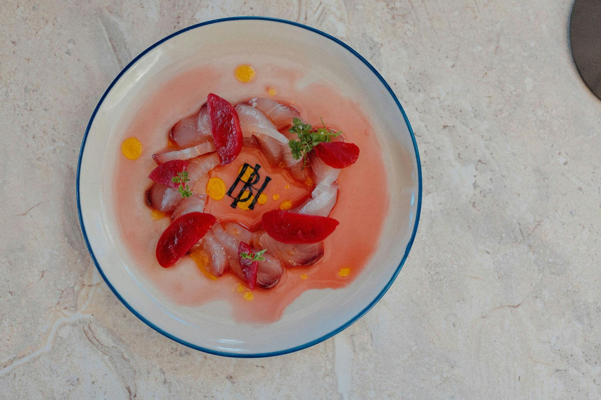 market fish crudo, plum, smoked chilli df, gf