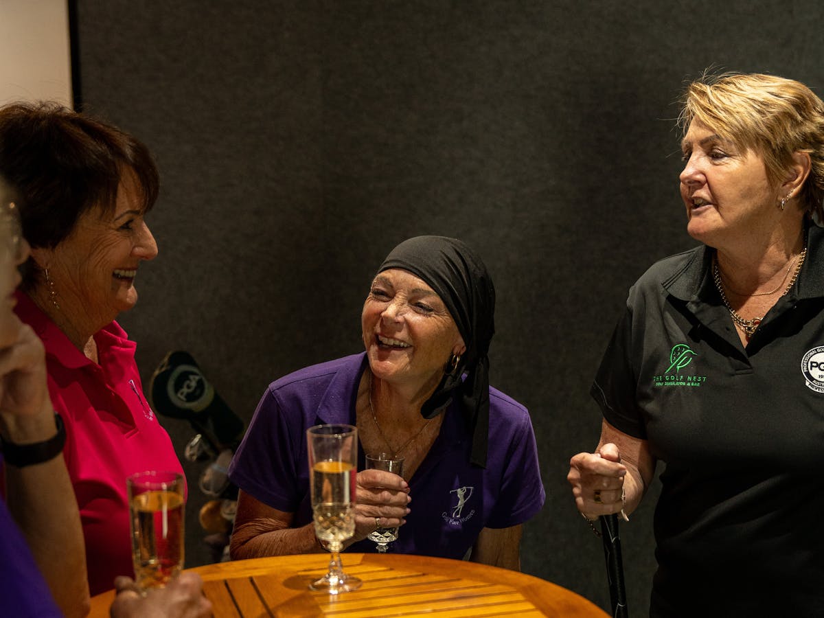 Ladies enjoying coaching and a drink at the Golf Nest Ladies enjoying coaching and a drink at the Golf Nest