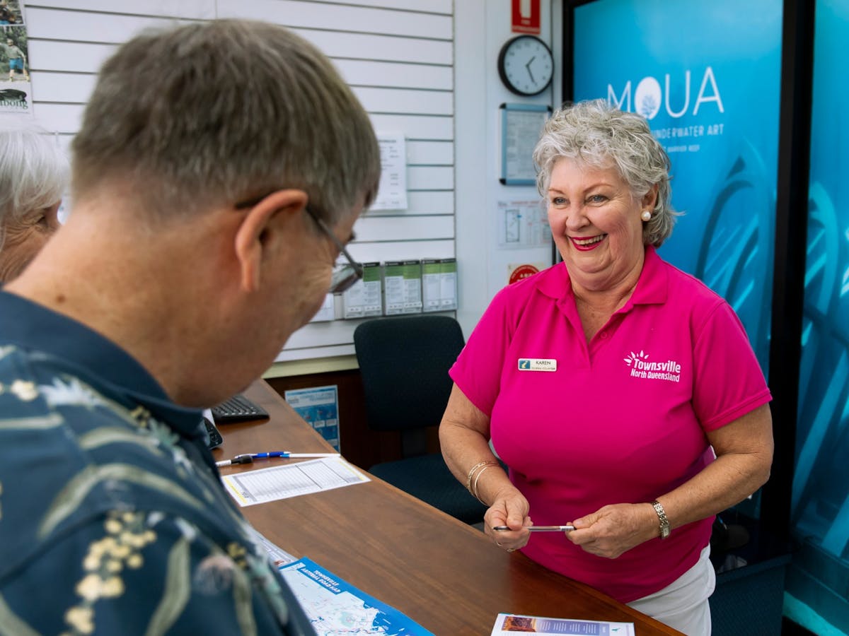 Tourism Ambassador assisting visitors