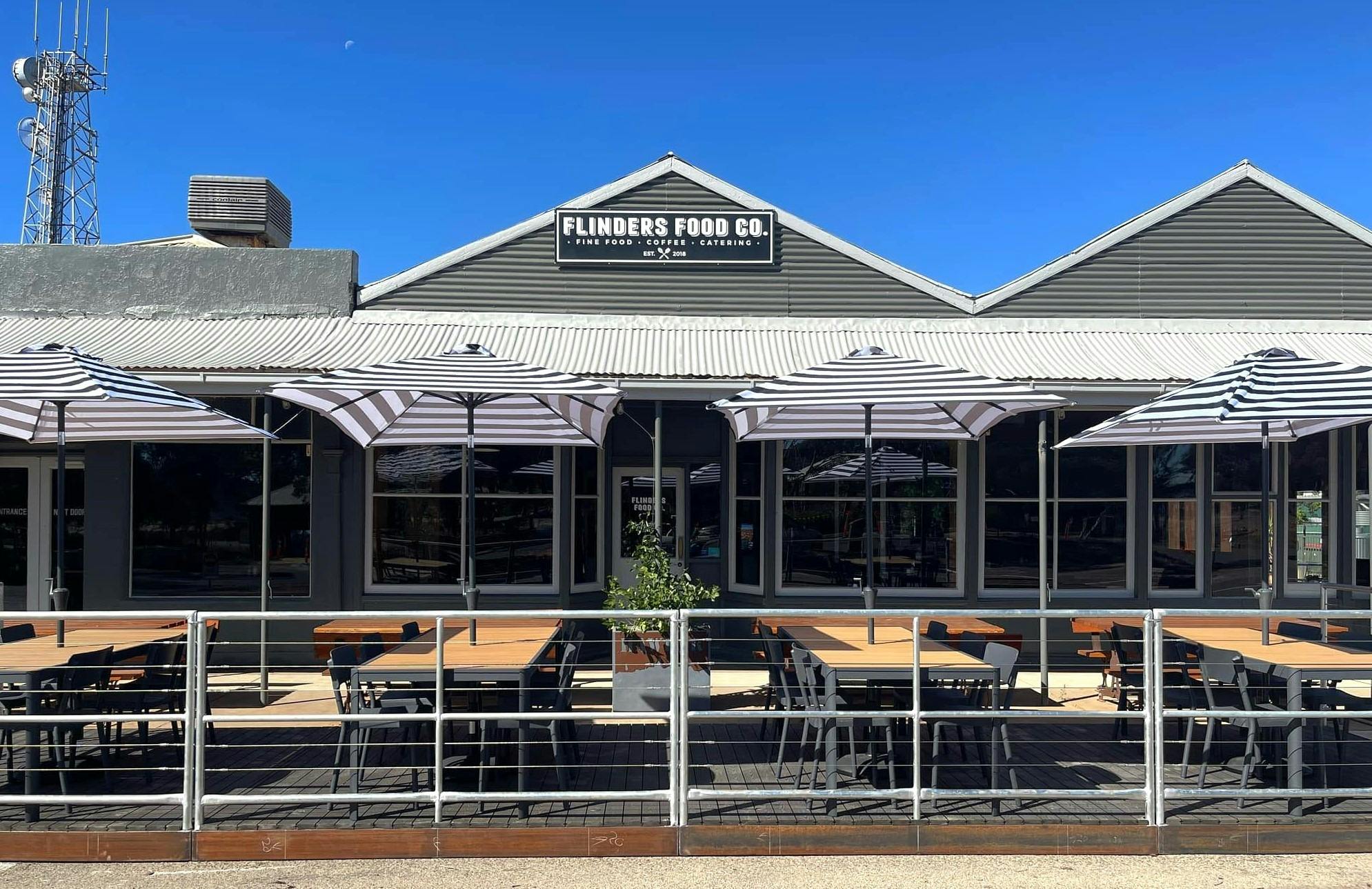 View of cafe with outdoor tables