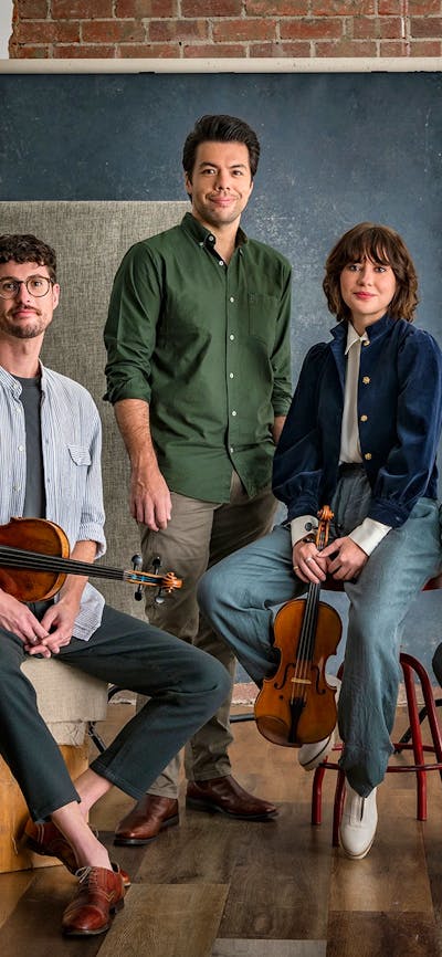 four musicians with their instruments