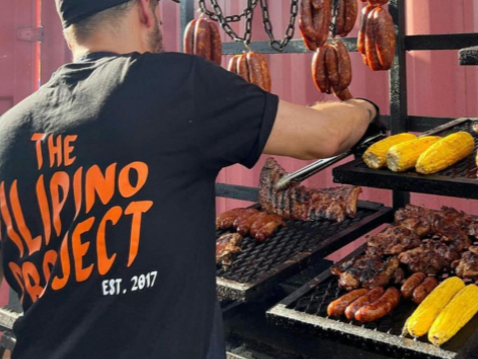 The Filipino Project on the grill cooking on fire