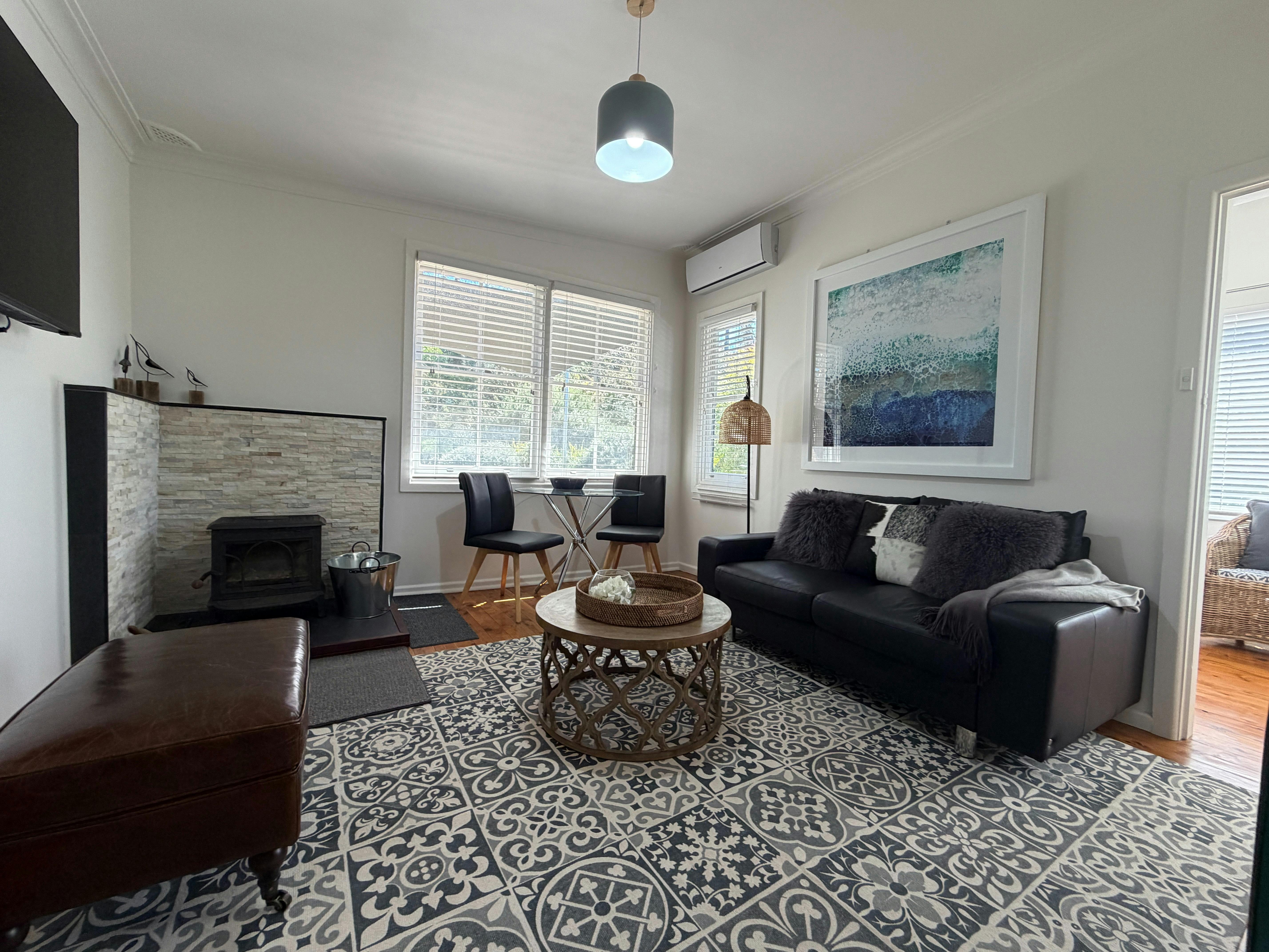 Comfortable lounge with TV free Netflix & WiFi  Dining table and chairs with outlook onto gardens