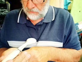 Hand crafted spoon display and spoon carving demonstration