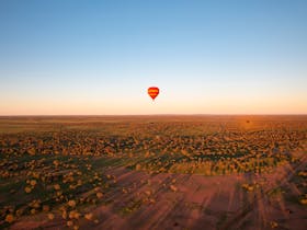 Hot air balloon in the air Alice Springs