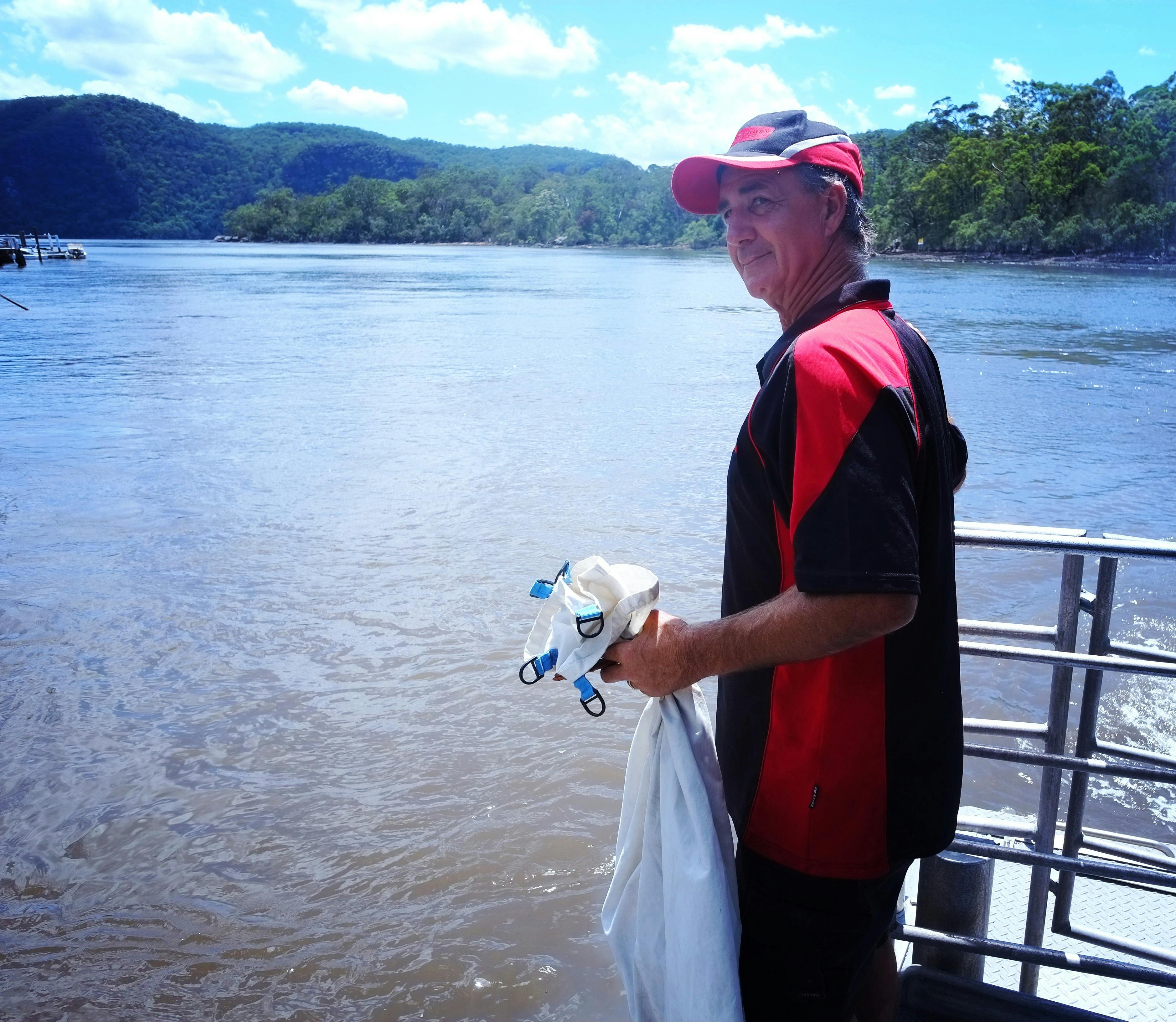 Dropping off the mail in old-school mailbags on the Hawkesbury River with The Riverboat Postman