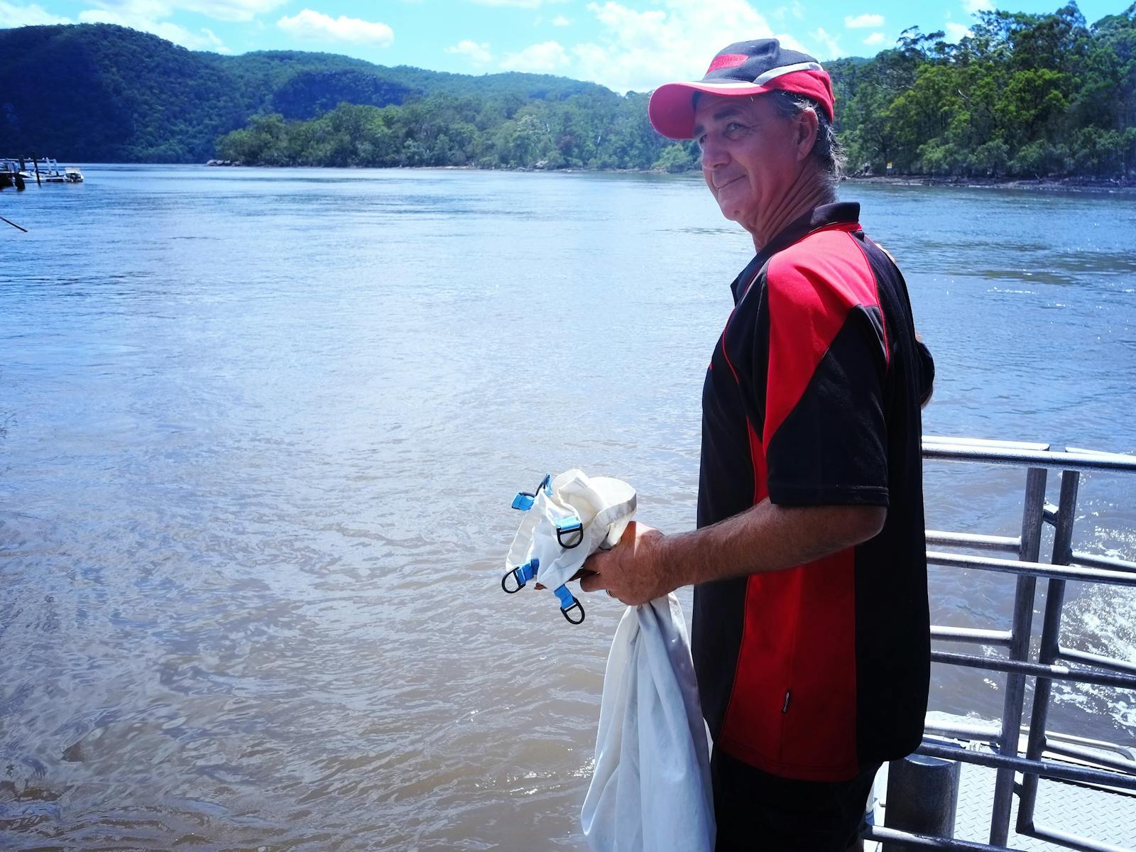 Dropping off the mail in old-school mailbags on the Hawkesbury River with The Riverboat Postman