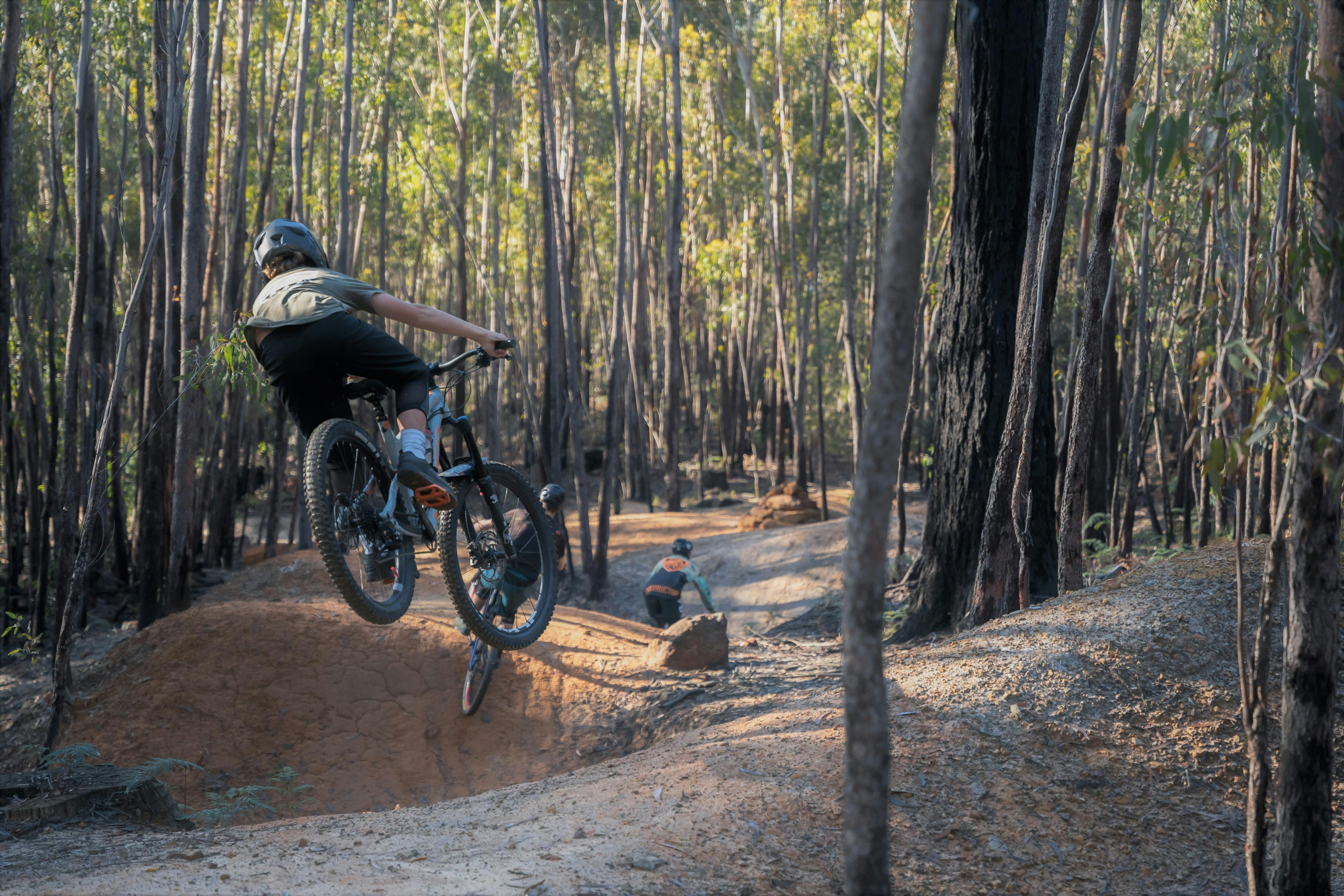 Riders enjoying St Helens MTB trails during a lesson