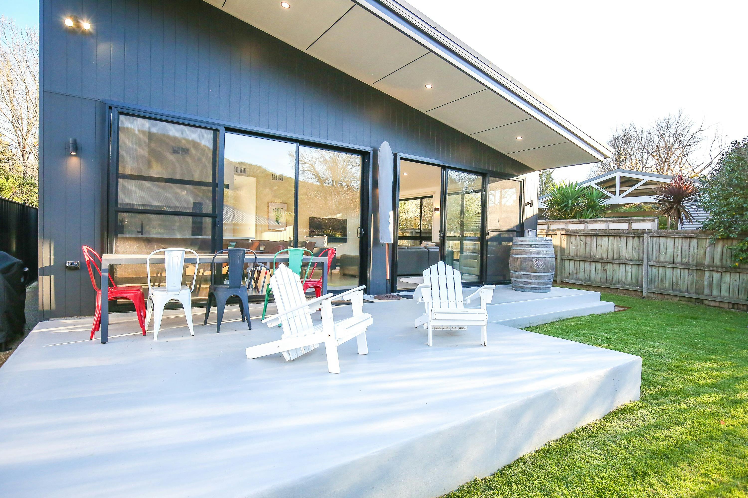 Lawn chairs in the backyard patio sitting area