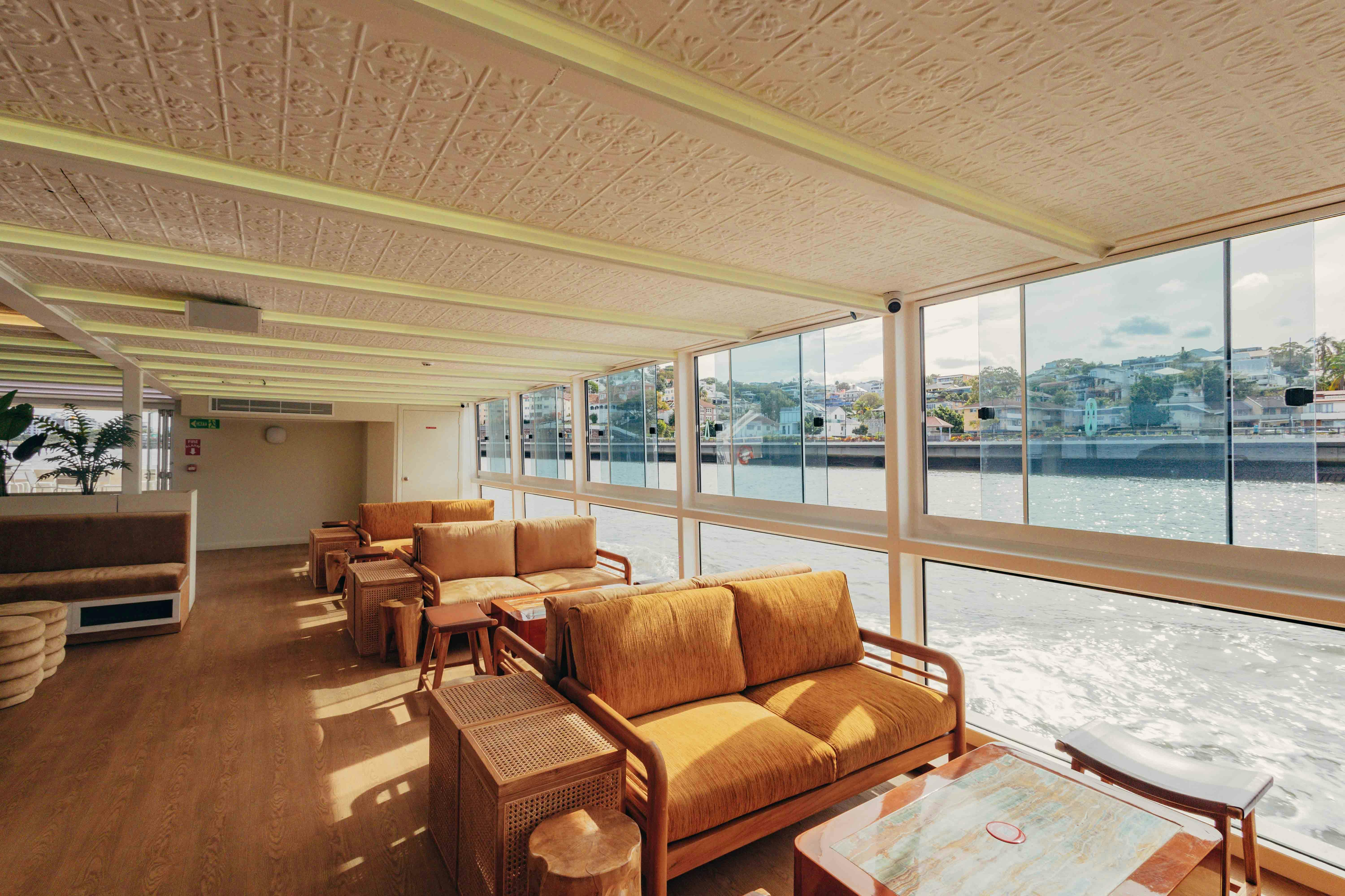 Unwind with friends on River Deck—ambient live music, relaxed seating, and easygoing vibes.