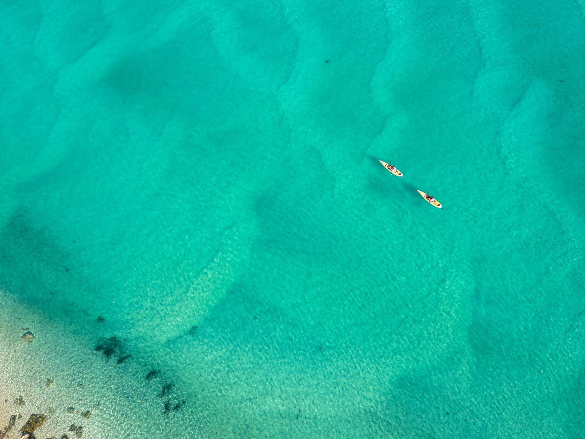 Drone photo of guests paddling Pambula River