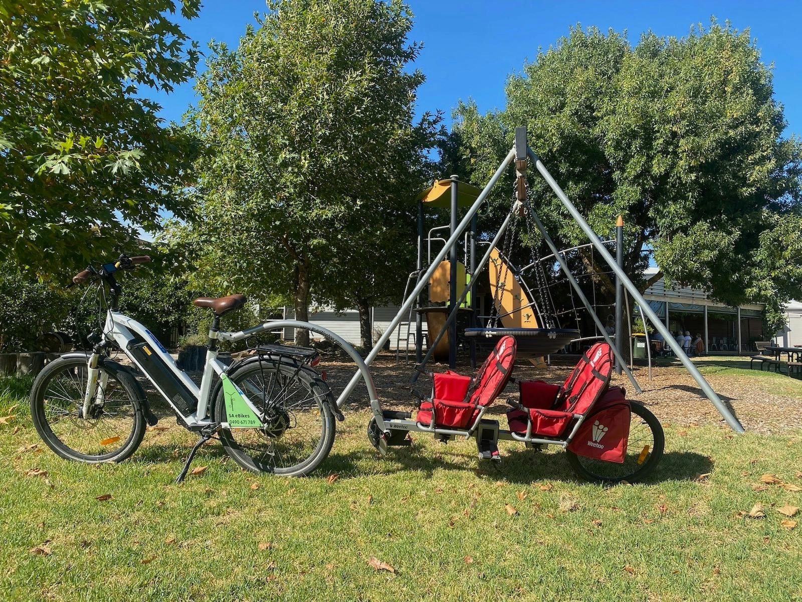 Tag-along beside playground