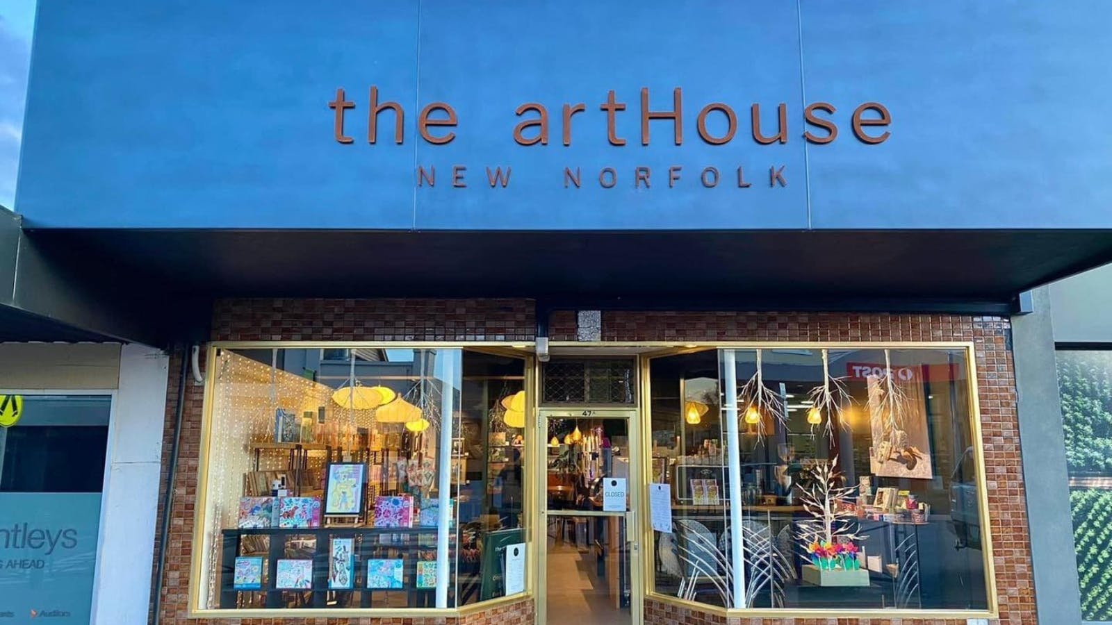 The exterior of the artHouse New Norfolk. Large windows let you see what's happening inside