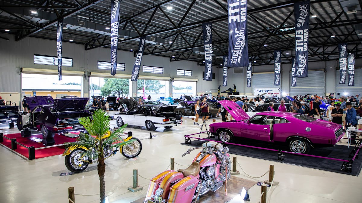 Show cars and motorcycles on display inside the Rockynats Elite Pavilion.