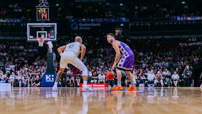 Matthew Dellavedova with ball in Kings game against Taipans