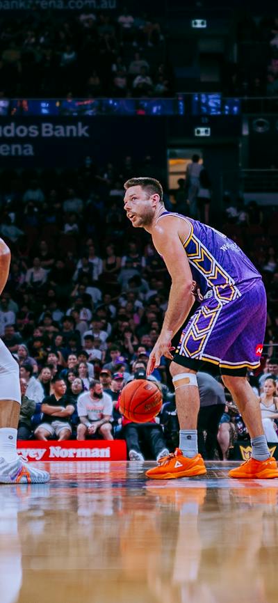 Matthew Dellavedova with ball in Kings game against Taipans