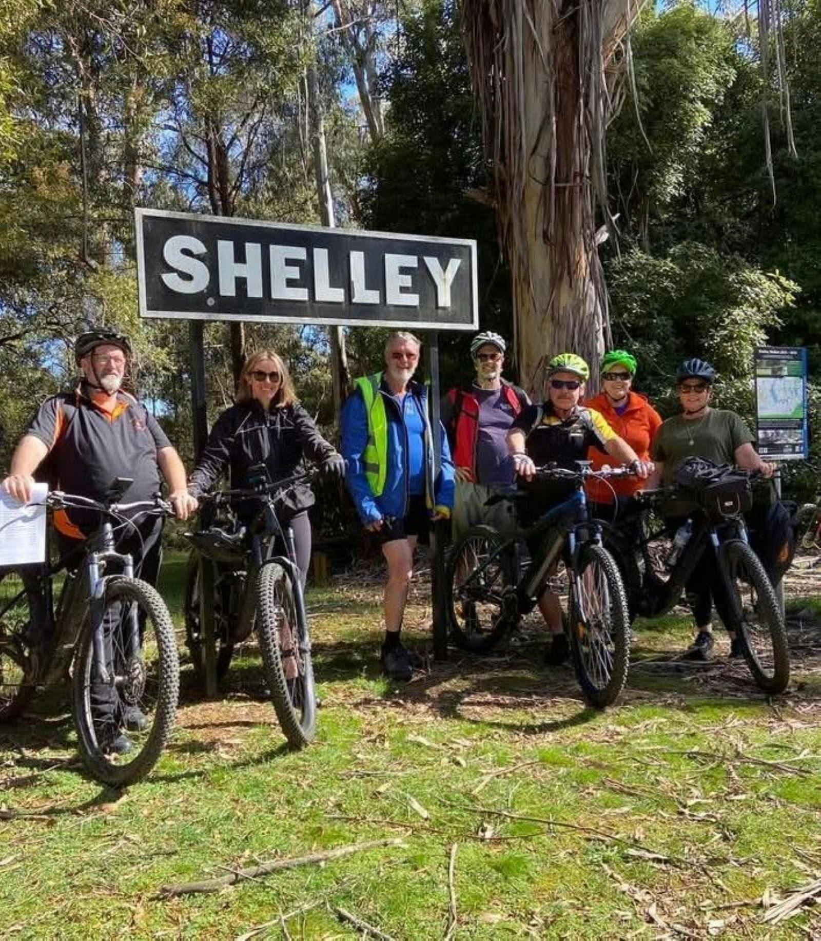 Group of people on cycles at the start of High Country Rail Trail
