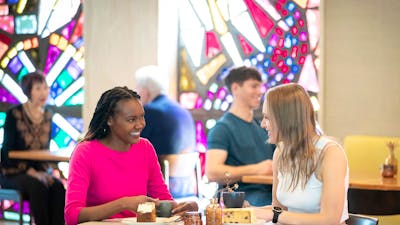 People inside the Bookplate cafe at the National Library of Australia