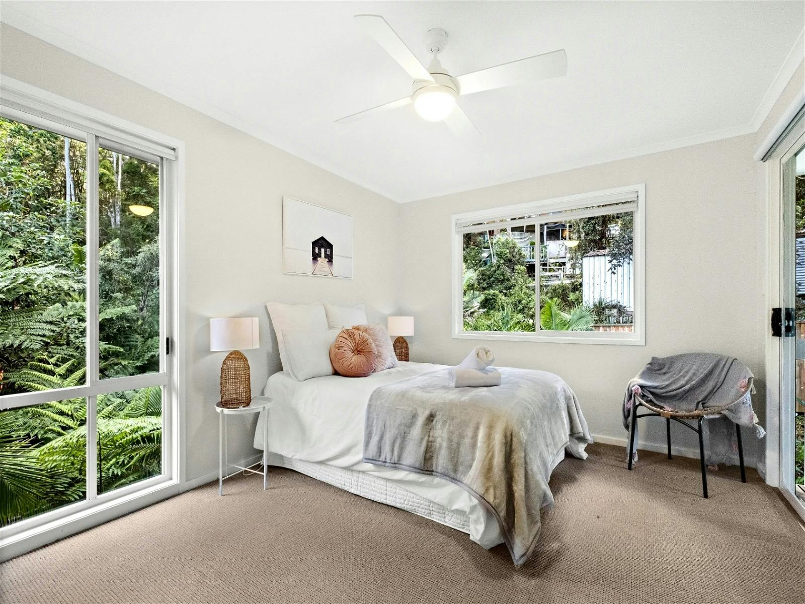 Cozy single bedroom perfect for relaxation with lush greenery views