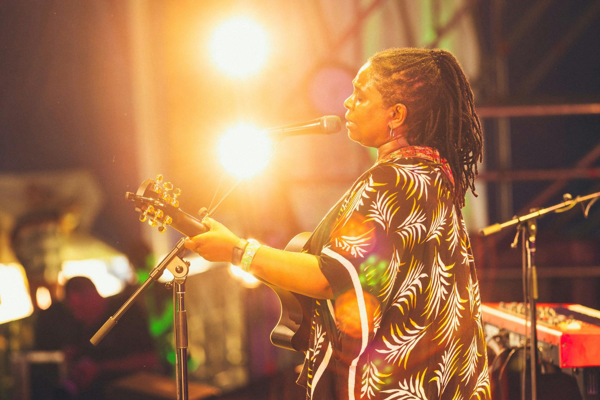 Ruthie Foster performing on stage