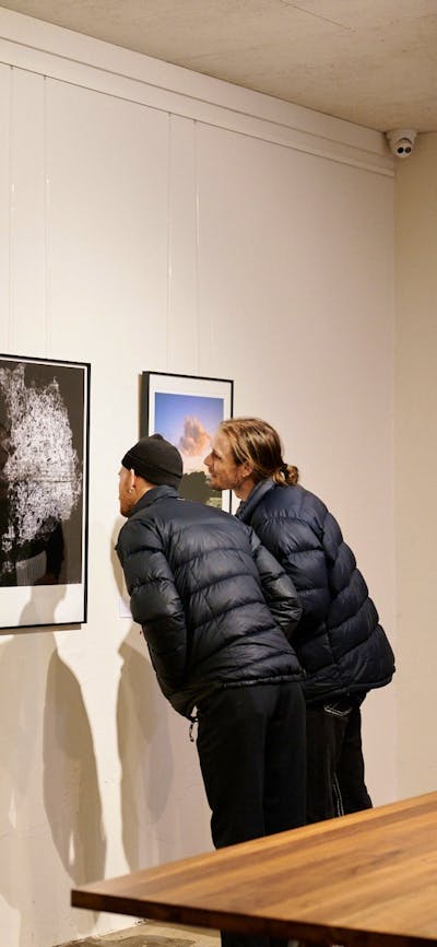 Visitors looking at work by Sammy Hawker
