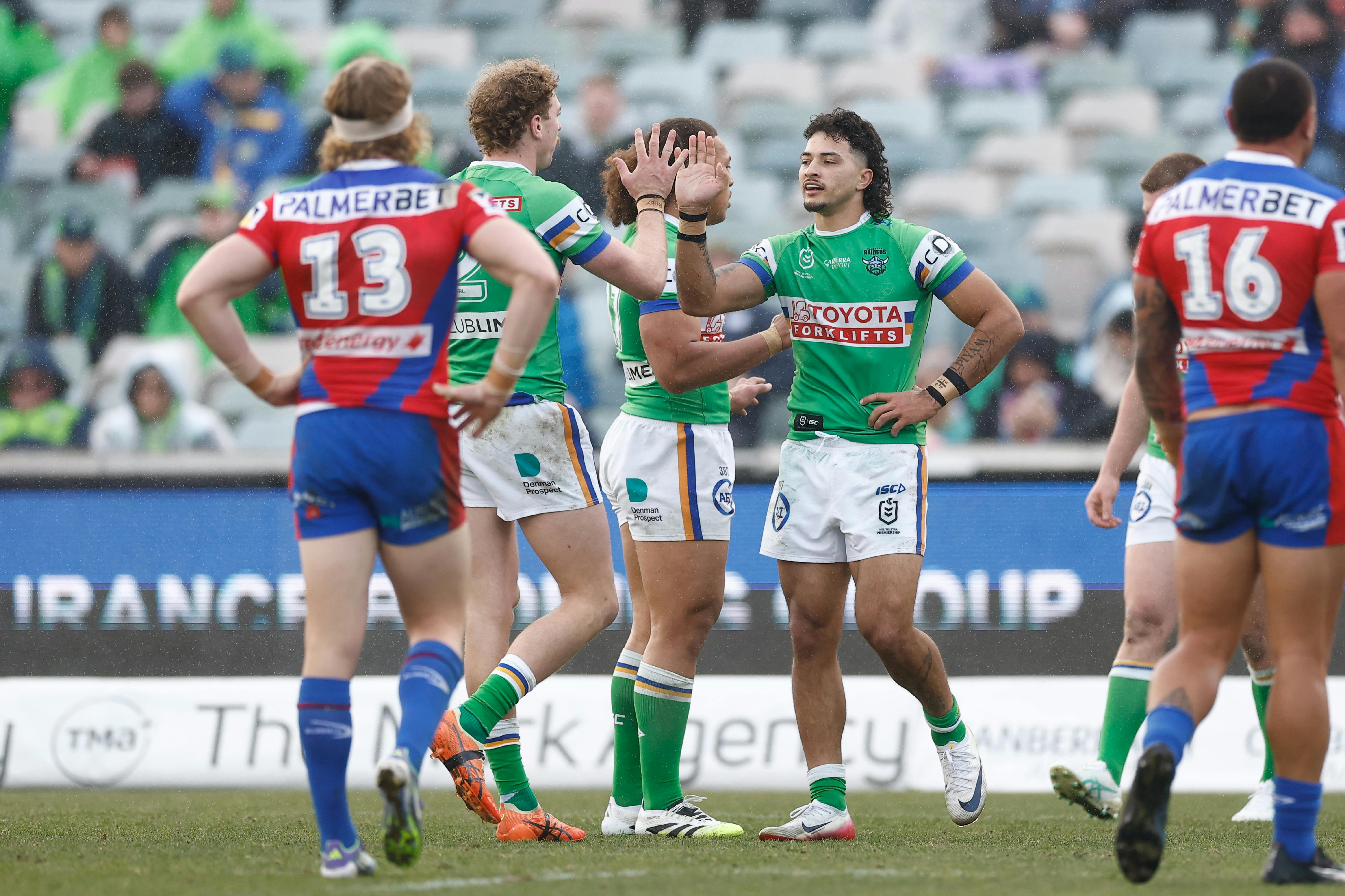 Canberra Raiders player Xavier Savage celebrating a try.