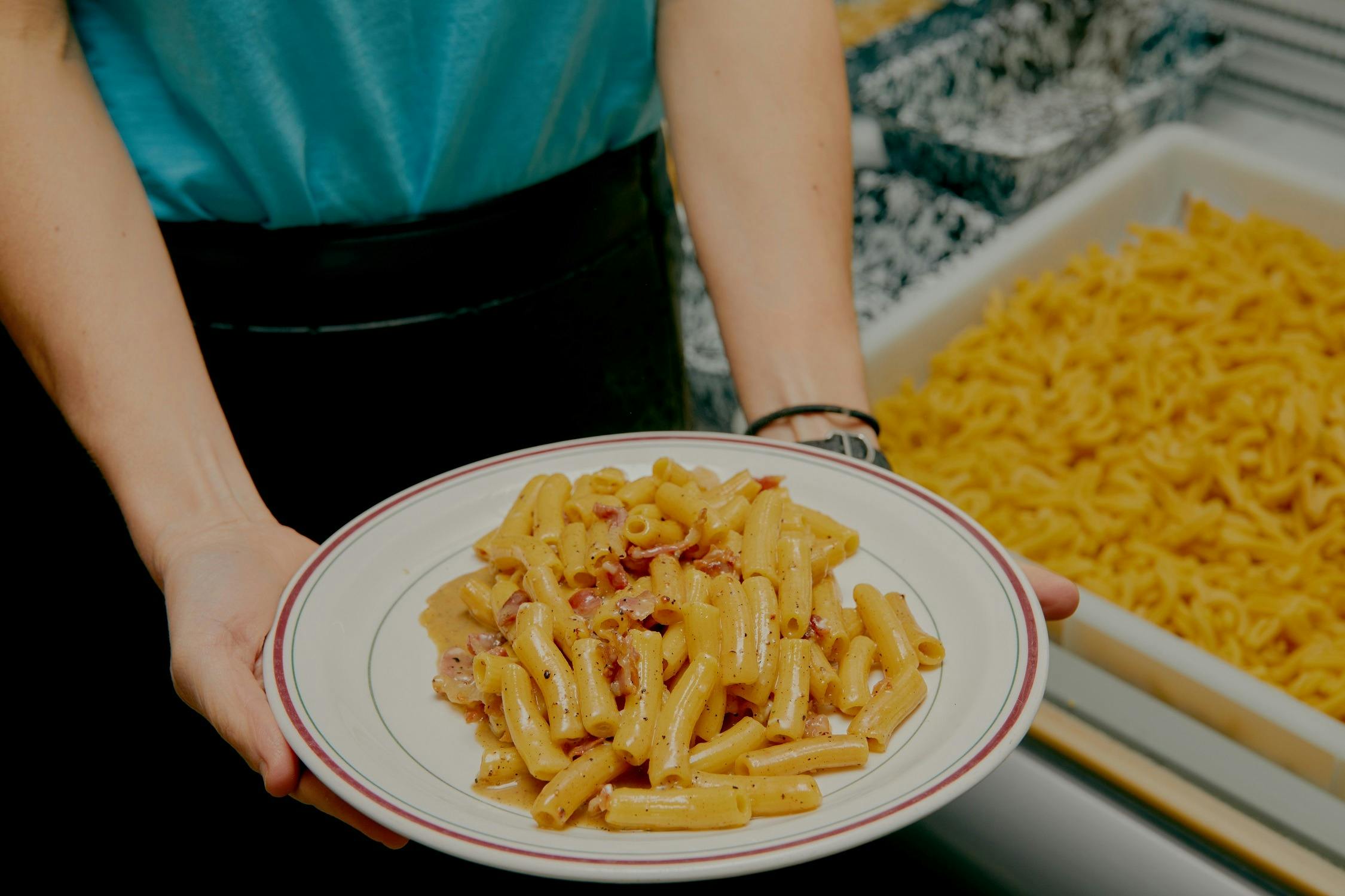 a delicious plate of fresh pasta served on a white plate