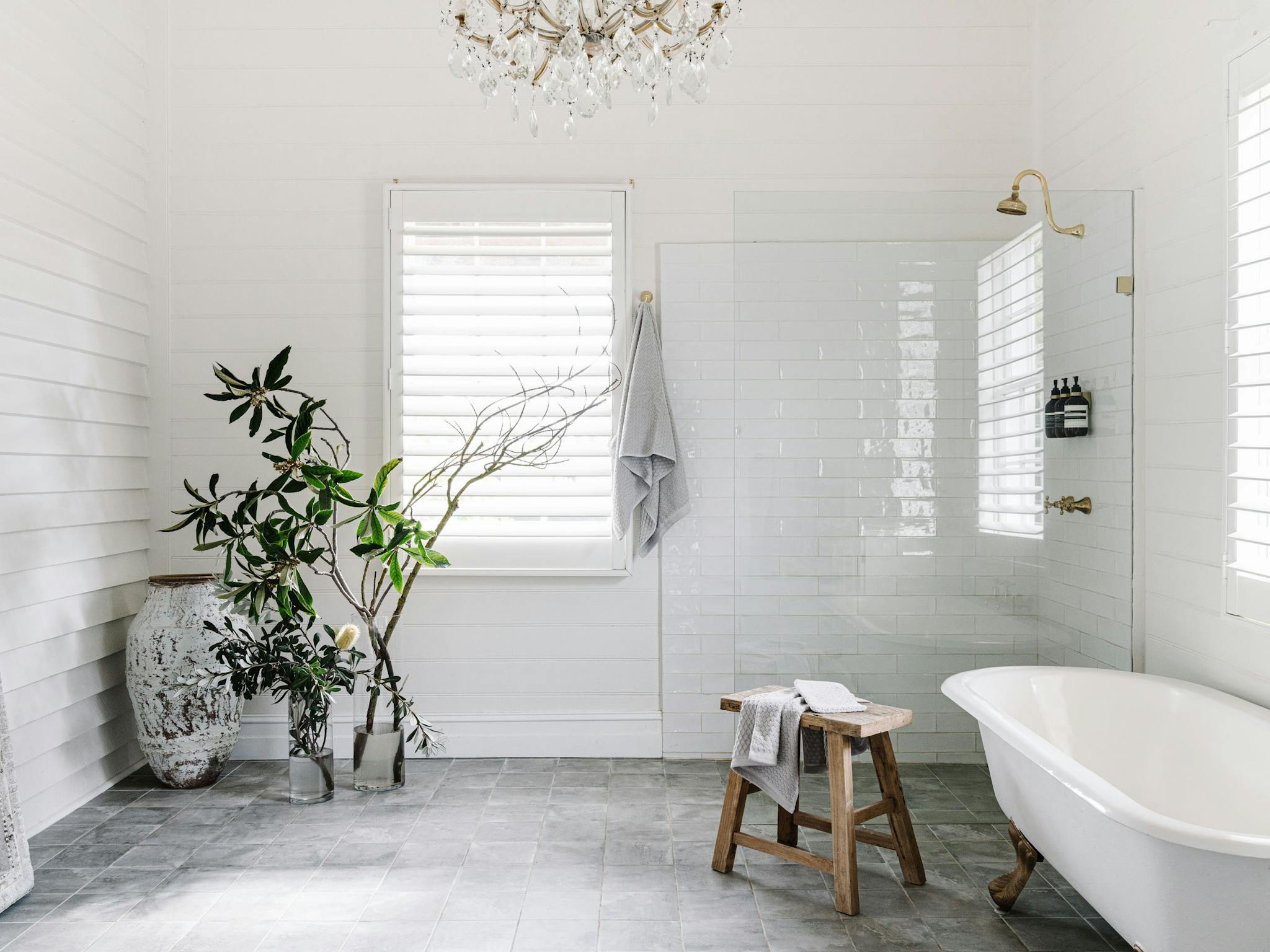 Rustic luxury bathroom with shower and bathtub