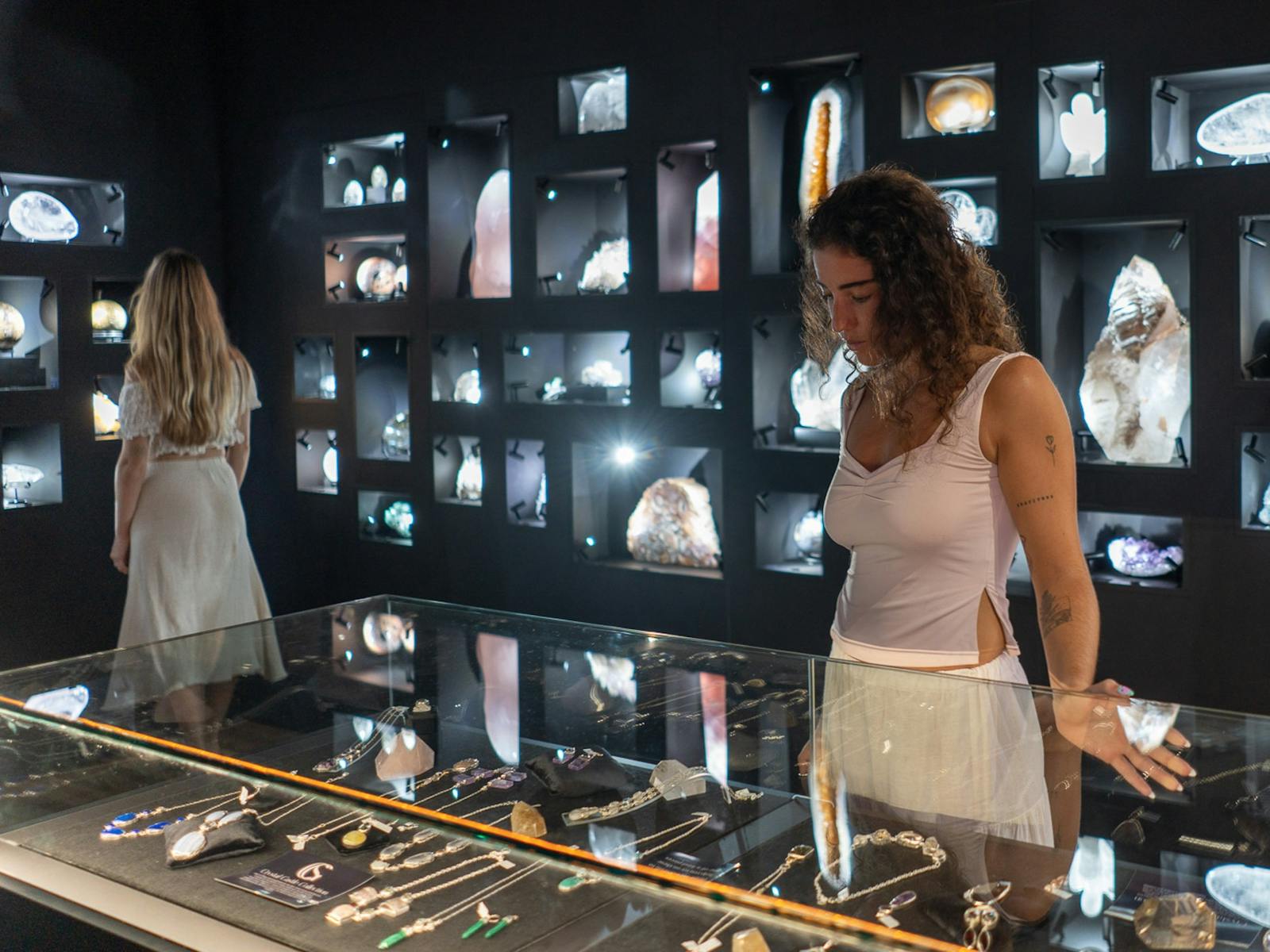 Two friends exploring the newly renovated Castle Jewels retail store