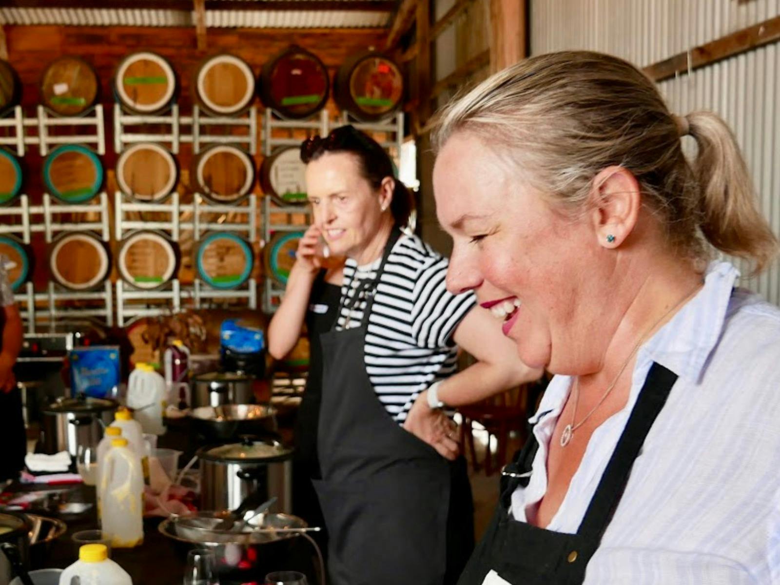 smiling lady enjoying cheese making