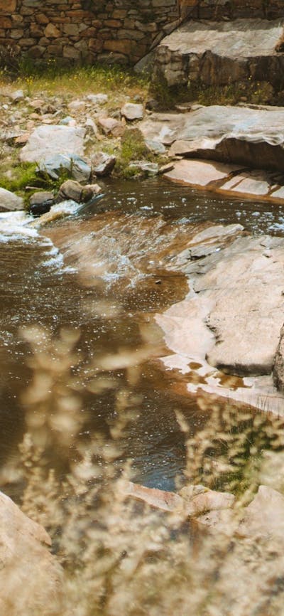 Person wandering Adelong Falls Gold Mill Ruins, Adelong, Snowy Valleys, NSW