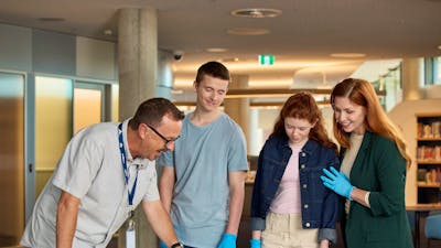 Visitors looking at Collection Items in the Charles Bean Research Centre at the Memorial