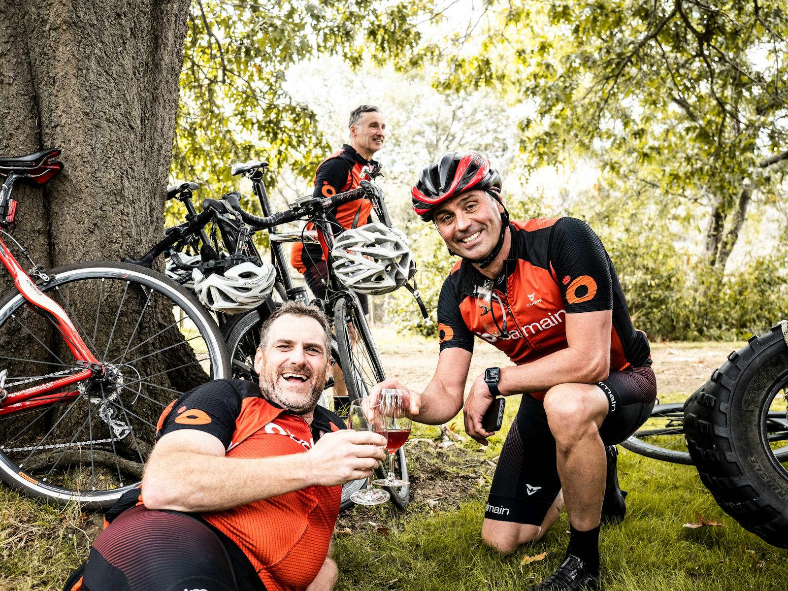Cyclists enjoying Tassie wine after ride
