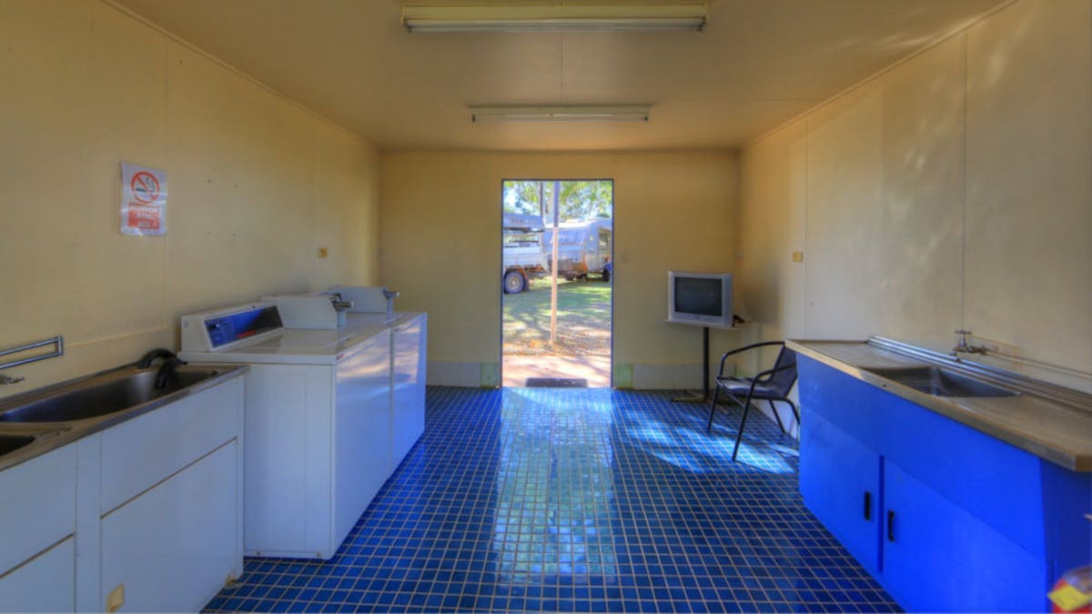 Both laundries have two washing machines and a dryer