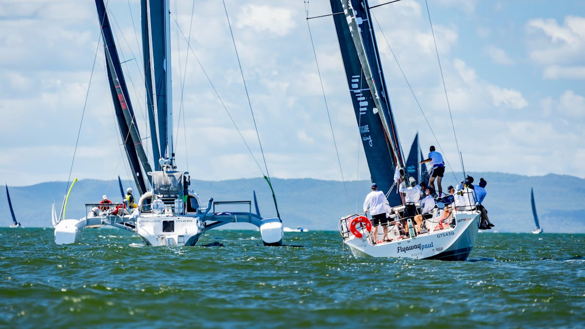 two sailing boats racing across the ocean
