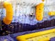 Tackling the inflatable climbing wall at Buller Air Zone