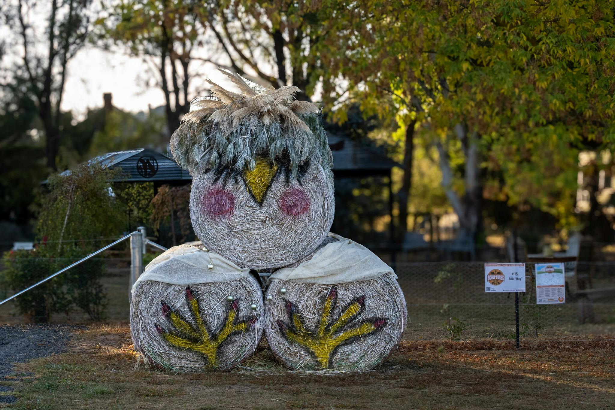 3 haybales with a chicken painted on them