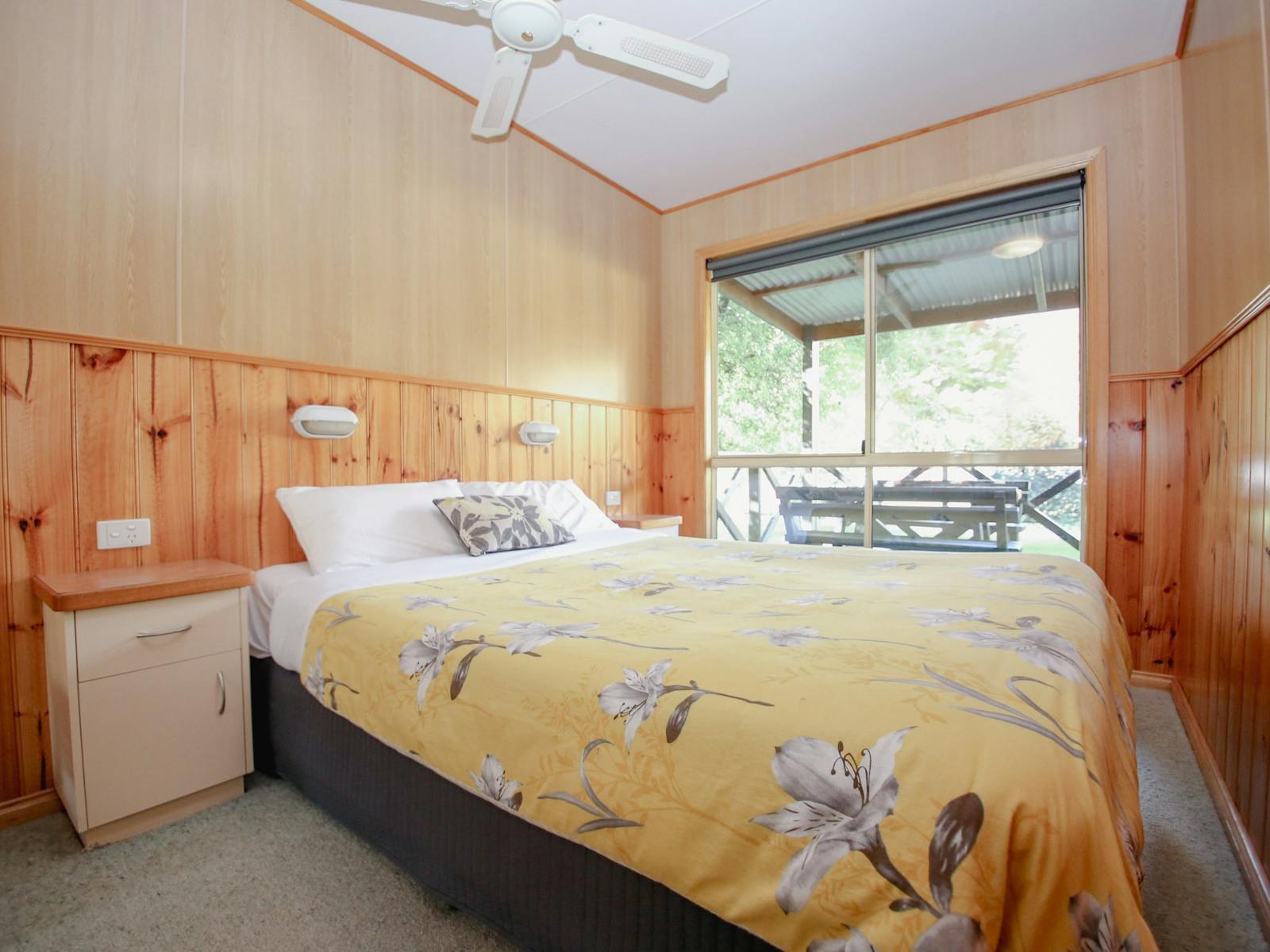 image of master room in Cabi with a queen bed beside a window